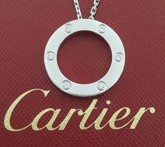 You are Purchasing a Cartier Love 6 Diamonds 18K White Gold 0.18 ct Round Brilliant Cut Diamond Necklace 16". The Necklace weighs 14 grams of solid 18K White Gold, 23.6 mm wide, 2.7 mm thick, 16" long with 6 natural diamonds weighing approximately 0.18 ct, F+ in color, VS+ in clarity, measuring approximately 2-2.1 mm in diameter. The Clasp is stamped "Cartier 750 © OJO". This is a large version, comes with service papers from Cartier & Cartier Pouch. Please follow us on Instagram for more unique items & specials: Exquisite_Jewelers_Inc ~The ring can be seen in person at Exquisite Jewelers in Palatine, IL **847**202**7889** Your happiness is our priority and we strive to provide you with the best quality products and service. If you are not fully satisfied with our product, please contact u White Gold Necklace, White Gold Necklaces, Cartier Love, Fine Jewellery Necklace, Round Brilliant Cut Diamond, Brilliant Cut Diamond, Round Brilliant, Cartier, Favorite Jewelry