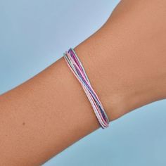 It’s the bracelet that started it all. Each one is handmade, waterproof and totally unique— in fact, the more you wear it, the cooler it looks. Grab yours today to feel the Pura Vida vibes. WaterproofGo surf, snowboard, or even take a shower with them on. Easily AdjustableOne size fits all, easy to slip on and off. 100% waterproof- Wax-coated- Adjustable from approximately 2-5 inches in diameter- Because jewelry products are handcrafted by artisans, dimensions may vary from piece to piece Casual Purple Bracelet For Everyday, Casual Everyday Purple Bracelets, Casual Hypoallergenic Braided Bracelets, Casual Friendship Wristband For Summer, Casual Purple Braided Bracelet As Gift, Casual Purple Bracelets With Sliding Knot, Casual Everyday Braided Bracelets, Casual Multicolor Wristband For Beach, Casual Purple Friendship Bracelets As Gift