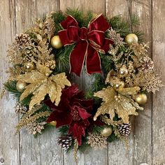 a christmas wreath hanging on a wooden wall