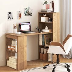 a computer desk with a laptop on top of it next to a book shelf and chair