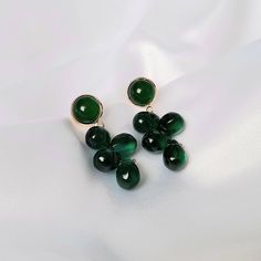 Don't miss out on these beautiful green bead drop earrings. They work with a large variety of looks and add a bit of sparkle to your outfit. MORE jewellery pieces available on our shop! Any questions please message we are happy to help. Free postage in UK Thank you for shopping with us Heather&Bumble 📪Follow us at: Instagram: heatherandbumble Twitter: Heather_Bumble Pintrest: Heather & Bumble Green Bead Drop Earrings -  Bead Earrings,Bead Jewellery,Green Earrings In The UK,Green Jewellery In The UK,Emerald Green,Gold Earrings Green Jade Earrings For Pierced Ears, Green Beaded Dangle Teardrop Earrings, Green Teardrop Beaded Earrings For Party, Green Jade Earrings For May Birthstone, Green Beaded Crystal Earrings, Elegant Green Beaded Teardrop Earrings, Green Teardrop Beaded Earrings For Gifts, Green Teardrop Clip-on Earrings For Gift, Green Teardrop Beaded Earrings With Dangling Beads