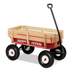 the radio flyer wagon is made from wood and has four wheels on each side, with two