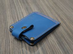 Blue Trifold Wallet With Rfid Blocking For Everyday Use, Blue Wallets With Coin Pocket As Gift, Blue Leather Trifold Wallet With Card Slots, Blue Leather Card Holder For Daily Use, Blue Wallet With Coin Pocket As Gift, Blue Wallet With Card Slots As Gift, Blue Rectangular Wallet With Key Clip, Blue Rectangular Trifold Wallet For Daily Use, Blue Rectangular Card Holder With Rfid Blocking