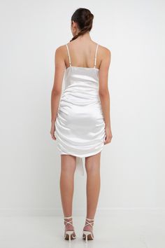 Shine at your next big event in this Asymmetrical Waterfall Drapped Satin Mini. The beautiful satin material will make you feel like royalty as you walk in the room. The asymmetrical waterfall drape and cowl neck add an extra touch of elegance that is sure to turn heads. The shirred bodice and adjustable spaghetti straps provide a comfortable and figure-flattering fit. You'll love how you look and feel in this gorgeous mini dress. Asymmetrical waterfall drape Cowl Neck Satin Adjustable spaghetti Dress Asymmetrical, Dresses Cocktail, Satin Material, Dresses Maxi, Cowl Neck, Walk In, Spaghetti Strap, Bodice, 404 Not Found