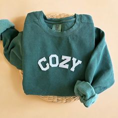 Cozy up with our Comfort Colors Cozy Sweatshirt this fall and winter season! The perfect sweatshirt to wear all year round!  - Our sweatshirt material is super soft and high quality! ♡ - Garment-Dyed Sweatshirt (Sustainable style)  - 80% cotton, 20% polyester - All our sweatshirts run a UNISEX fit. (Both for men and women) They fit true to size. But if you like a more baggy look, we highly recommend sizing up. - These letters are embroidered iron-on patches that have been heat pressed, not embro Super Soft Cotton Casual Sweatshirt, Super Soft Casual Cotton Sweatshirt, Super Soft Comfy Fit Sweatshirt, Comfy Super Soft Sweatshirt, Casual Super Soft Cotton Sweatshirt, Comfy Cozy Fit Sweatshirt, Super Soft Relaxed Fit Sweater For Winter, Super Soft Comfortable Sweatshirt, Winter Sweatshirt With Super Soft Relaxed Fit