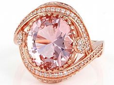 Pre-Owned Bella Luce ® Esotica™ morganite and white diamond simulants 4.63ctw oval and round, Eterno™ 18k rose gold over sterling silver ring. Measures approximately 0.75"L x 0.69"W and is not sizeable..  This product may be a customer return, vendor sample, or on-air display and is not in its originally manufactured condition.  It may not be new.  In some instances, these items are repackaged by JTV. Dazzling Pink Rings With Pave Setting, Pink Gold Jewelry With Center Stone For Formal Occasions, Formal Pink Gold Jewelry With Center Stone, Rose Gold Morganite Jewelry With Brilliant Cut, Pink Diamond Ring With Pave Setting For Gift, Pink Diamond Ring With Pave Setting As Gift, Pink Pave Setting Ring, Pink Pave Setting Ring Jewelry, Oval Rose Gold Rings With Pave Setting