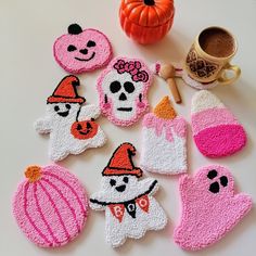 decorated cookies are arranged in the shape of halloween characters