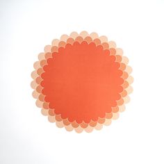 an orange circle on a white background with no image in the top right hand corner