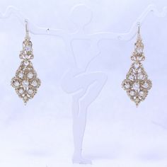 Description:  Thank you for considering this pair of acid tested k? yellow gold & diamond dangle earrings. These earrings feature a total of 8 diamonds to each earring. The bottom half of the earrings represents a flower shape. The top part of the earrings has a scroll motif. The center stone on the bottom of the earrings measures approximately .07ct. The other stones measure approximately .05ct. This gives us a total of approximately 0.42ct of diamonds throughout each earring. E-G color, VS1, approx over 1 carat. Size: 1 11/16" in length , 5/8" in width at widest point Weight: pair weighs 7.3 grams Please feel free to send inquiries, and please examine each photo closely. ?-Policies?- Please note: We are required by law to collect 9.75% sales tax for all Illinois residents. Bidding: By bi Diamond Dangle Earrings, 10 Picture, Antique Earrings, Sales Tax, Fine Jewellery Earrings, 1 Carat, Flower Shape, A Flower, Gold Diamond