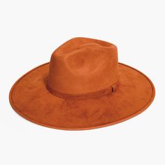 Burnt Orange Rancher Fedora Hat by AB.LINO Meet our OG wide-brimmed Rancher fedora. This hat is designed to make a statement — for elegance, for everyday and for the billion moments in between. Hand-made from stiffened Mexican suede with a rigid brim and crown, this style is designed to hold its shape through thick and thin. Trimmed with a Minimal Mexican Suede Hat Band. Made from stiffened Mexican suede Spot / specialist clean Brim width: 4″ / 10.16 cm Crown height: 4″ – 4.75″ Rigid crown desig Suede Hat, Crown Heights, Crown Design, Fall Favorites, Dyeing Process, Wide Brimmed Hats, Hat Band, Brim Hat, Fedora Hat