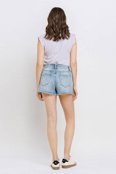 Modeled after mom shorts from the '90s, this pair of frayed denim shorts brings relaxed, classic style to any casual outfit. Material: 99% cotton 1% spandex Stretch: Slightly stretchy Care: Machine wash cold, gentle cycle, tumble dry low. Model is 5'9" and is wearing a size small Imported Product MeasurementsS: 13.5 (Waist), 18.0 (Hips), 13.0 (Length)M: 14.0 (Waist), 18.5 (Hips), 13.5 (Length)L: 14.5 (Waist), 19.0 (Hips), 14.0 (Length)XL: 15.0 (Waist), 19.5 (Hips), 14.5 (Length) Casual Mid-rise Jean Shorts With Frayed Hem, Casual Distressed Cotton Shorts, High Rise Stretch Cotton Jean Shorts, Stretch High Rise Cotton Jean Shorts, Stretch High-rise Cotton Jean Shorts, Medium Wash Stretch Distressed Jean Shorts, Distressed Stretch Jean Shorts In Medium Wash, Casual Distressed Shorts, Stretch Distressed Medium Wash Jean Shorts