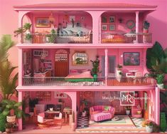 a pink doll house with lots of furniture