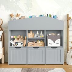 a child's room with toys and stuffed animals on the shelves in front of it