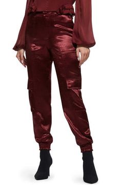 Luxurious textured satin lends a glam look to military-inspired cargo trousers fashioned in a slim silhouette with multiple flap pockets. Smocked cuffs 58% polyester, 42% recycled polyester Hand wash, dry flat Imported This product meets Nordstrom Sustainably Sourced Materials criteria: contains at least 30% sustainably sourced materials Satin Cargo Pants, Glam Look, Glam Looks, Trouser Style, Military Inspired, Sound Waves, Cargo Trousers, Flap Pocket, Cargo Pants