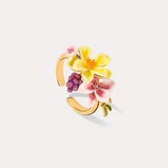 Adorn your finger with vintage elegance and modern charm with our Sweet Grape Flower Ring. This beautiful piece features a gold brass enamel and is crafted with a nod to cottagecore style. Whether it’s for yourself or as a special gift, this ring is sure to add a touch of nature-inspired beauty to any ensemble. DETAILS Plating: 18k Gold  Materials: 18k Gold on Brass, Enamel Size:  Adjustable Weight:  4.5g Gold Enamel Flower Ring For Anniversary, Yellow Gold Enamel Flower Ring Gift, Gold Flower-shaped Enamel Ring, Gold Enamel Flower Ring, Elegant Gold Enamel Flower Ring, Vintage Flower Ring For Spring Gift, Gold Vintage Jewelry For Spring, Spring Vintage Gold Jewelry, Grape Flower