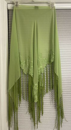 Cajon Beachwear Shawl Scarf Beach Cover With Fringe Kiwi Green NWOT. This item will be shipped USPS mail. I ship same day whenever possible. This is a beautiful kiwi green shawl scarf coverup by Cajon Beachwear with fringe. One size. This scarf measures approximately 66 inches long. From the top to the bottom of the V is approximately 28 inches” with 8” Fringe trim. The fringe is very nicely done. This is really a beautiful piece. Embellished with floral motif. Looks great as a cover up with a d Wrap Scarf Top, Scarf Coverup, Green Shawl, Future Shop, Sheer Scarf, Green Scarf, Scarf Top, Thrift Shop, Halloween 2024