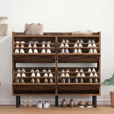 there are many pairs of shoes on the shelf