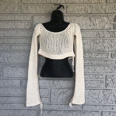 This pattern includes 2 patterns for 2 Summer Cotton Sweaters. Sweaters are made in Summer White and Soft Natural. Samples shown are cropped sweaters; row count for Full length is included with each pattern. Sweaters used 7/8” and 11/16” peg spacing looms. Materials:Loom: Boye or KB Loom(KISS, Knifty Knitter and Cinduwood loom)Yarn: 100% Cotton or Mercerized Cotton Yarn:XS/S 2 skeins Med 3 skeins L 4 skeins Skillset: Beginner This product is an INSTANT DOWNLOAD PDF, not a finished productPattern White Crew Neck Crop Top For Winter, Winter White Crew Neck Crop Top, White Cotton Cropped Sweater, White Cropped Cotton Sweater, White Fitted Cropped Sweater, White Casual Cropped Sweater, White Cropped Crop Top For Fall, Casual White Knitted Patterns, White Crop Top For Winter