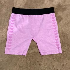 Size 2x/3x Pretty Pink And Black Elastic Waistband Shorts. Hearts Down The Side. Pink Elastic Sports Bottoms, Elastic Pink Sports Bottoms, Pink Stretch Bottoms Shorts, Pink Stretch Short Bottoms, Fitted Pink Biker Shorts For Loungewear, Pink Stretch Cotton Activewear, Pink Elastic Short Length Bottoms, Pink Stretch Bottoms With Built-in Shorts, Pink Elastic Short Bottoms