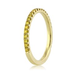 a yellow diamond ring on a white background