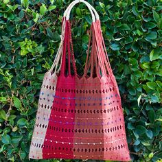 This unique bag is beautifully made on a waist loom, (Telar de Cintura) by artisans from San Juan Andres Larraizar Chiapas México.Each bag is individually handwoven with a unique colors and designs . There is not other like it! Use this reusable and eco-friendly, 100% cotton loom tote bag as a shopping bag for farmer's markets . Dress it down with a t-shirt and jeans or shorts! or to add a boho vibe to any outfit. Details: Tote measurements: 14 x 16.5 Handle drop: 10" Material: 100% Cotton Tasse Beautifully Made, Unique Bags, T Shirt And Jeans, Boho Vibe, Artisan Craft, Cotton Totes, Outfit Details, Unique Colors, Loom