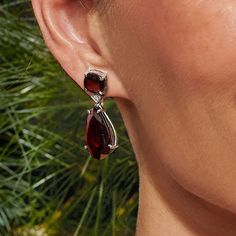 Ross-Simons - 25.00ct t. w. Garnet Drop Earrings, Diamond Accents in Silver. An RS exclusive. Bursting with the rich color of a perfectly aged merlot, these dramatic drop earrings deliver full-bodied color and glamorous shine. Featuring 25.00 ct. t. w. square cushion-cut and pear-shaped garnets and sparked with diamond accents. Set in polished sterling silver. Hanging length is 1 1/8". Post/clutch, garnet drop earrings. Garnet birthstones are the perfect gift for January birthdays. Formal Pear-shaped Gemstone Earrings, Pear-shaped Pierced Earrings For Formal Occasions, Formal Pear-shaped Pierced Earrings, Timeless Gemstone Earrings For Formal Occasions, Formal Pear-shaped Clip-on Earrings, Elegant Red Hallmarked Earrings, Classic Gemstone Earrings For Formal Occasions, Classic Formal Gemstone Earrings, Elegant Red Earrings With Polished Finish