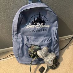 Disneyland Items For Sale! This Backpack Is From The Walt Disney Studios. It Is Great For Picnics, Traveling, Or Any Disney Lover To Take To The Parks. Also Included Are Minnie Ears From Their 100 Years. These Are Great For Everyday Or Your Next Disney Adventure. They Are Both Retailed Around $40 Each. If Interest In One Item Please Message Me. Disney Backpack, Disney Bags, Disney Bag, Walt Disney Studios, Adventures By Disney, Disney Studios, Disney Lover, Minnie Ears, Items For Sale