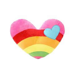 a heart shaped pillow with a rainbow on it