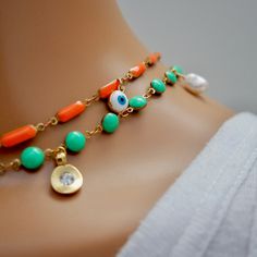 Handcrafted truly one-of-a-kind unique necklace, a vintage chain with gorgeous orange oblong enamel stones, little charms throughout. Wear it single alone or as a lariat, layered with other necklaces. Style tip: Wrap it three times around the wrist as a bracelet. So cute! Necklace is 22" in length Variety of different charms Vintage enamel chain Made with love in Los Angeles Complimentary gift wrapping provided All sales final. Orange Beaded Chain Jewelry For Gift, Bohemian Orange Double Strand Jewelry, Handmade Orange Double Strand Necklace, Vintage Orange Beaded Chain Jewelry, Necklaces Style, Vintage Chain, Unique Necklace, Vintage Orange, Cute Necklace