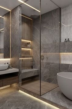 a modern bathroom with marble walls and flooring