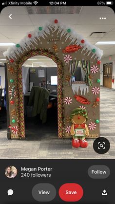 an office cubicle decorated for christmas with gingerbreads and candy canes on the door