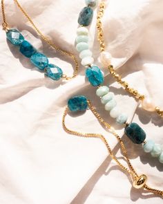 Our Saylor Pearl Bracelet is absolutely eye-catching! What do we love about it? The stunning gold beads mixed with the natural pearls make for a beautiful piece to stack with your other bracelets. Hand-strung Amazonite Beaded Bracelets As Gift, Amazonite Hand-strung Bracelet As A Gift, Gold Beaded Amazonite Bracelets, Bohemian Single Strand Beaded Bracelets As Gift, Adjustable Amazonite Beaded Bracelets Hand-strung, Adjustable Hand-strung Amazonite Beaded Bracelets, Handmade Amazonite Round Bead Bracelets, Turquoise Faceted Beads Rondelle Bracelets, Adjustable Rondelle Bracelets With Spacer Beads