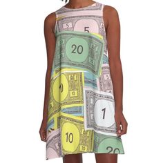 a women's dress with money on it and the number one in yellow, blue, green, pink