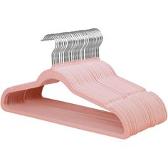 a pink plastic hanger with metal clips