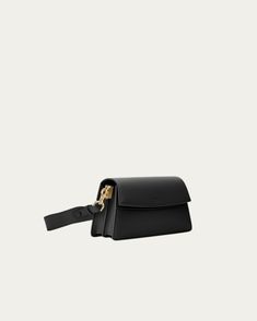 A miniature version of a classic shoulder bag, with every bit of the functionality. Perfectly proportioned with two interior compartments and a zip divider to hold all your essentials. Detachable long strap effortlessly converts into a crossbody. Handcrafted from our soft pebbled vegan ultrafiber leather. Shoulder Bag Black, Mini Shoulder Bag, Champagne Gold, Gold Hardware, Vegan Leather, Zip Pockets, Divider, Shoulder Strap, Shoulder Bag