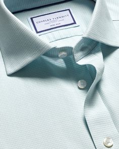 100% cotton with natural stretch, Available in classic, slim and extra slim fit, Non-iron, Spread collar, Classic and slim fit: back pleats, Extra slim fit: back darts, Mitred button cuff with two buttons, Machine washable - Cutaway Collar Non-Iron Stretch Kensington Weave Shirt - Aqua Green | Men's Charles Tyrwhitt Cutaway Collar Non-Iron Stretch Kensington Weave Dress Shirt - Aqua Green Single Cuff Size 15.5/33 Cotton Classic Wrinkle-resistant Shirt For Spring, Classic Wrinkle-resistant Business Casual Tops, Classic Wrinkle-resistant Tops For Business Casual, Elegant Business Tops Wrinkle-resistant, Elegant Business Top With Wrinkle-resistant Fabric, Elegant Wrinkle-resistant Business Top, Classic Summer Shirt With Concealed Placket, Classic Slim Fit Wrinkle-resistant Tops, Elegant Wrinkle-resistant Work Tops