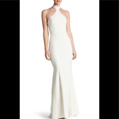 Off White Details & Care Deeply Cutaway Shoulders And A Wide Mock-Neck Collar Add A Contemporary Note To The Classic Halter Styling Of A Fluid-Crepe Mermaid Gown. 59 1/2" Center Front Length; 63" Back Length (Size Medium) Hidden Back-Zip With Ties Behind Neck Halter-Style Mock Turtleneck Cutaway Shoulders Full-Length Mermaid Skirt Lined 90% Polyester, 10% Spandex Dry Clean Made In The Usa Special Occasion No Flaws Fitted V-neck Halter Dress For Wedding, White Fitted Halter Neck Evening Dress, Fitted Halter Neck Wedding Dress, White Halter Neck Dress For Formal Occasions, White Halter Neck Formal Dress, White Backless Dinner Dress, White Fitted Halter Dress For Formal Events, White Fitted Halter Dress For Formal Occasions, White Halter Maxi Dress For Wedding