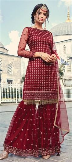 Red and Maroon color Salwar Kameez in Georgette fabric with Embroidered work Red Churidar With Dabka Work For Reception, Unstitched Red Churidar For Reception, Red Churidar With Intricate Embroidery For Reception, Red Semi-stitched Salwar Kameez For Reception, Red Semi-stitched Sharara For Eid, Red Anarkali Unstitched Suit For Reception, Red Unstitched Suit For Reception And Festivals, Red Unstitched Suit With Intricate Embroidery For Reception, Red Unstitched Party Suit With Pallu