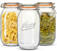 three mason jars filled with macaroni and cheese, pasta and pickles in them