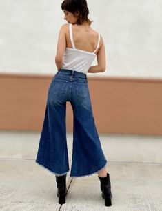 The amazing style, look and feel of the Cropped Gaucho Denim Jeans is just off the charts. Gaucho cut, frayed cuffs, and our super-soft premium denim make these jeans must-have. The cover model is 5'9" wearing size 26 Fabric: 66% Cotton 22% Repreve 8% Polyester 3% Rayon 1% Spandex Front Rise:10.25" Inseam: 24" Boyfriend Fit Jeans Outfit, Gaucho Pants Outfit, Gaucho Pants, 70s Inspired Fashion, Boyfriend Fit Jeans, Cover Model, 70s Inspired, Inspired Fashion, Boyfriend Fit