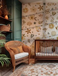 a baby's room with a crib, chair and wallpaper in it