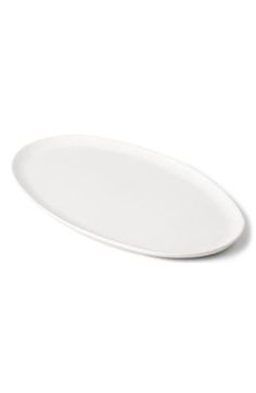 an empty white plate on a white background