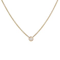 Our classic 14k gold pendant necklace features a solitaire round brilliant diamond, bezel set and suspended from a dainty chain - a subtle yet timeless sparkle from Gilded by G.St. Able to special order in rose or white gold- please allow 5 weeks for production and delivery. • 14k gold• 0.20ct round brilliant diamond (G-H color, SI clarity)• Spring ring clasp• Length: 16-17" All G.St collections are designed and crafted by us in NYC using recycled gold, conflict-free diamonds and responsibly sou Delicate Solitaire Round Pendant Necklace, Classic Solitaire Necklace With Bezel Setting, Formal Solitaire Necklace With Smooth Bezel Round Pendant, Classic Diamond Necklace With Bezel Setting, Elegant 14k Gold Solitaire Necklace With Bezel Setting, Elegant Birthstone Necklace With Single Diamond Round Pendant, Classic Yellow Gold Birthstone Necklace With Delicate Chain, Fine Jewelry Necklace With Smooth Bezel Round Pendant, Formal Solitaire Necklace With Smooth Bezel