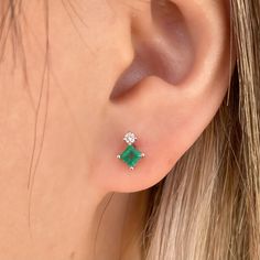 Materials: 14k Gold Gemstone: Earth-mined Diamonds and Genuine Emerald Total Diamond Carat Weight: 0.06 ct. Total Emerald Carat Weight: 0.44 ct. Stud Diameter: 7.4mm x 5.3mm Diamond Clarity: SI 1-2 Diamond Color: I color Description: These are natural, genuine diamonds and emeralds. These are not lab grown stones. Available in 14k yellow gold and 14k white gold. Perfect studs for everyday wear. This beautiful piece will not tarnish in the shower and will not irritate the skin. It will arrive in Diamond Emerald Earrings, Emerald Studs, Gold Earrings For Kids, Earring Minimalist, Emerald Earrings Studs, Gold Jewelry Simple, Tiny Studs, Diamond Carat, Emerald Earrings