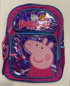 Peppa Pig Large Backpack - 16 inches BRAND NEW for Girls - Licensed - Purple Measures around : 16”H x 12”W x 5”D Two Front pockets with zipper closure One side vecro-closure flap pocket and one side meshed pocket Adjustable padded shoulder straps High quality product Purple Rectangular Backpack For Students, Purple Rectangular Backpack For Back To School, Purple Backpack For Students, Cute Standard Purple Backpack, Cute Purple Standard Backpack, Purple Backpack For End Of School Year, Purple Standard Backpack For End Of School Year, Cute Purple Backpack, Purple Backpack