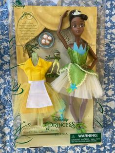 the princess and the frog doll is in its packaging