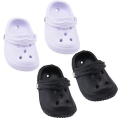 three pairs of white and black baby shoes