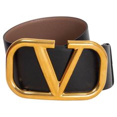 100% authentic Valentino VLOGO wide reversible waist-belt in light tan and black calfskin featuring a chunky gold-tone metal logo buckle. Has been worn once or twice and is in excellent condition. Comes with dust bag and box. Measurements Tag Size 75 Width 7cm (2.7in) Fits 72cm (28.1in) to 77cm (30in) Length 105cm (41in) Buckle Size Height 9.5cm (3.7in) Buckle Size Width 16cm (6.2in) Hardware Gold-Tone All our listings include only the listed item unless otherwise specified in the description ab Modern Black Belt With Gold-tone Logo Plaque, Modern Black Belt Buckle With Gold-tone Logo, Black Belt Buckles With Gold-tone Hardware For Work, Luxury Leather Belt Buckles With Logo, Designer Leather Belt Buckles With Logo, Designer Black Belt With Gold-tone Logo Plaque, Designer Black Belts With Gold-tone Logo Plaque, Chic Black Belt With Gold-tone Logo Plaque, Designer Leather Belt With Logo