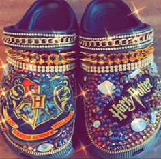 a pair of harry potter slippers with jewels on them