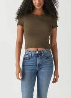 Not too long and not too short. We love this basic cropped tee with its high crew neckline, short sleeves and body skimming silhouette. The perfect length for your mid to high rise bottoms. We love this dark olive green color. It pairs well with denim and all your light neutrals. Details 100% Cotton, Medium weight Machine Washable TTS, One Size (fits like a true medium to get the look on the model) Short Sleeve Crop Top For Fall, Green Cropped T-shirt For Everyday Wear, Green Cropped Stretch T-shirt, Fitted Green Crop Top For Everyday, Green Stretch Cropped T-shirt, Weight Machine, Dark Olive Green, Olive Green Color, Michael Stars